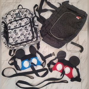 Used. Diaper bags and baby leash bundle.
